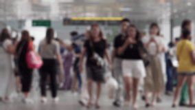 pedestrian bridge in a modern city, showcasing diverse people walking, socializing, and enjoying the urban environment. Lively atmosphere with city signage and architecture evident - Powered by Shutterstock - Get 15% off with code: PIKWIZARD15