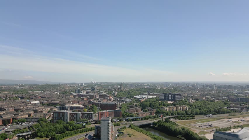 Static aerial copy space upper third empty while lower third shows Glasgow West End skyline, Glasgow, Scotland, UK