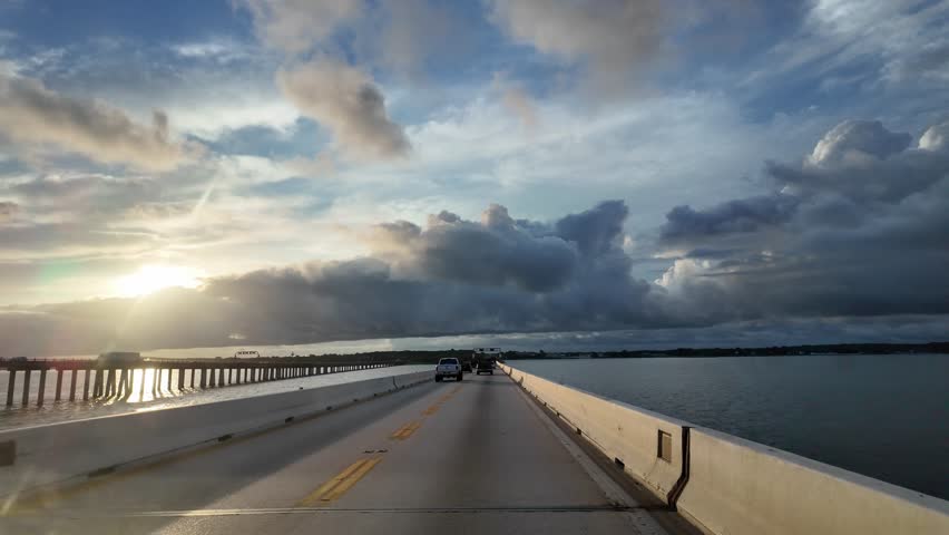 Road in sunset. Touristic route to adventure. Wanderlust adventure trip. Travel road route. Sunset road way. Touristic destination route. Highway motion. Travel destination