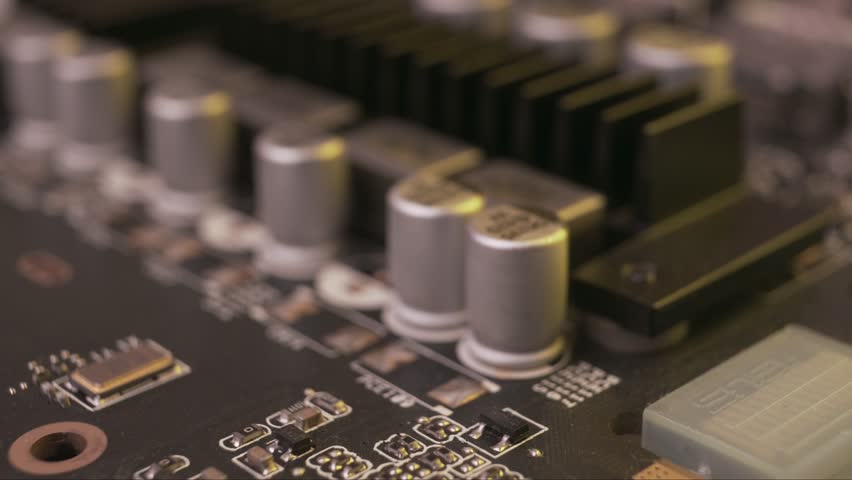 Electronic Circuits and peripheral parts of a computer motherboard circuit
