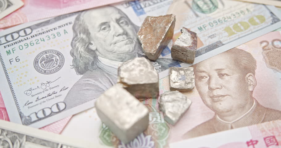 Critical minerals and rare earths, China - US trade truce, strategic mineral leverage : Metallic ores (representing critical minerals like gallium, germanium) resting atop U.S. dollar and Chinese yuan