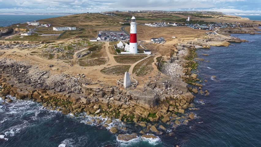 High angle shot of the rugged coastline and iconic lighthouse at Portland Bill, Dorset.