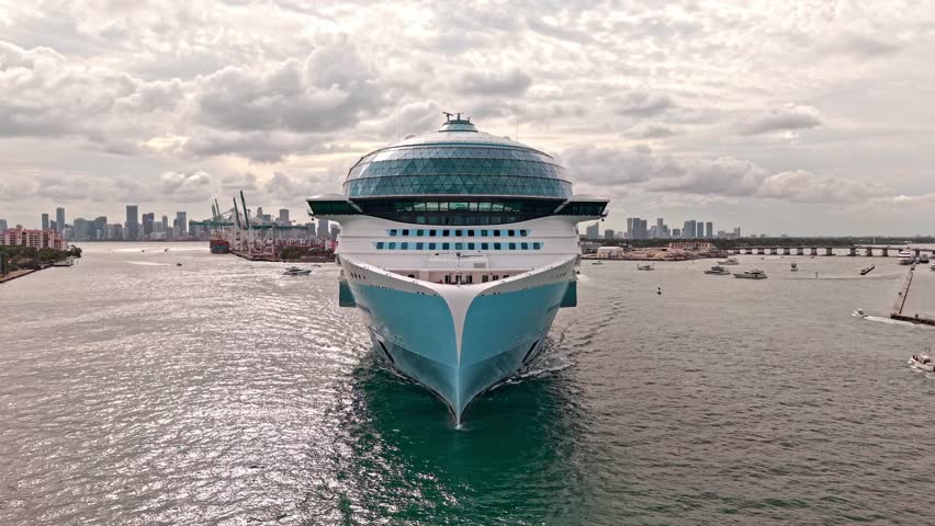 Miami tour. Cruise ship voyage. Aerial view of cruise in summer vacation. Cruise ship tour and travel at sea. Aerial view of luxury liner voyage. Ship leaving Miami beach port. Travel and Voyage