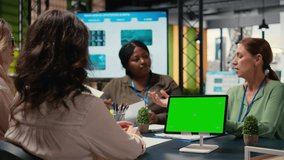 Group of businesswomen reviews project analytics with green screen, empowered by data and team collaboration. Female colleagues reviewing digital content, graphs or reports. Camera A. - Powered by Shutterstock - Get 15% off with code: PIKWIZARD15