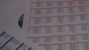 Businessman analyzing data charts and reports for marketing strategy, financial planning, accounting, and business development in modern office - Powered by Shutterstock - Get 15% off with code: PIKWIZARD15