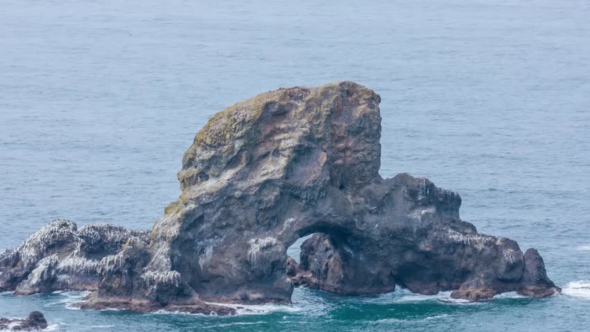Footage highlights sea stacks and trails at Ecola State Park. Known for its coastal cliffs, forest paths, tide pools, and beach vistas, it