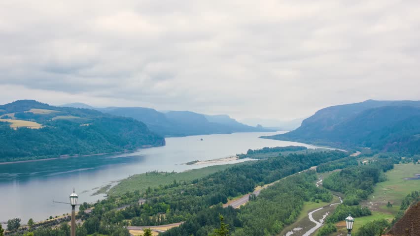 Footage shows Columbia River Gorge in Oregon from Vista House, a well-known landmark that offers panoramic views of cliffs, river, and forested valleys.