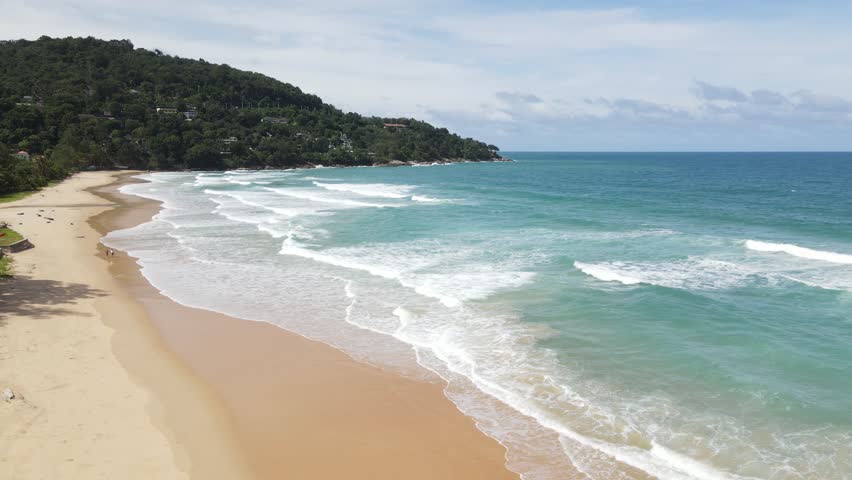 Amazing Seaside beach paradise island. Tropical landscape of sunny summer coast with sea sand and nature trees With clouds sky. Luxury travel and vacation. Exotic shore landscape. ocean surface waves