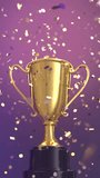 Gold trophy with confetti celebrating success in seamless loop animation, Vertical video - Powered by Shutterstock - Get 15% off with code: PIKWIZARD15