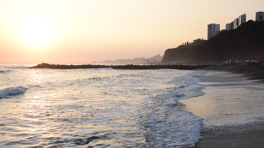 View of sunset by the beach in Lima