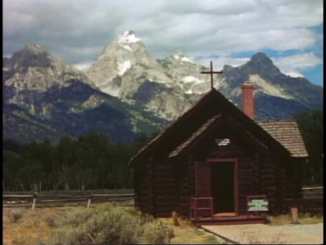 Grand Teton National Park, front range, medium shot, rustic chapel in foreground