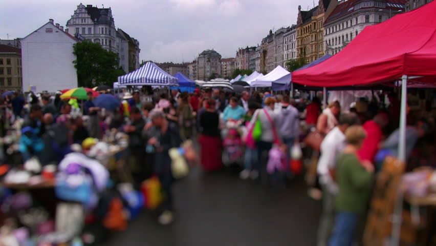 People shopping at Fleamarket Naschmarkt (time lapse), July 10 2012 in Vienna.