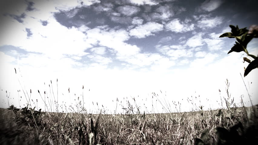US Army tank from the second world war passes.  Clip treated with various filters.