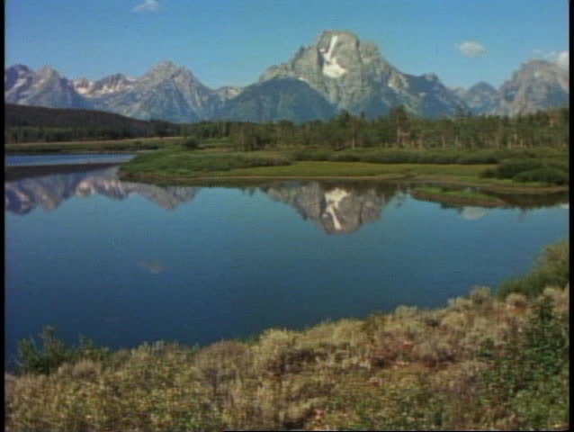 Grand Tetons National Park, Moraine Mountain, wide shot, mirrored in Moraine Lake