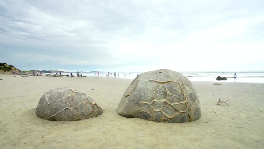 Moeraki boulders on koekohe beach, otago, south island, new zealand on cloudy day