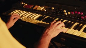 Playing piano vintage retro synthesizer. Close up of man hands playing jazz on the piano. Fingers on the piano, vintage colors. A very close look at a jazz pianist hands. Man playing the piano, close - Powered by Shutterstock - Get 15% off with code: PIKWIZARD15