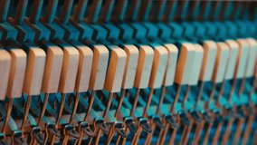 Man playing and tuning piano, Old vintage piano hammers with strings close up,  - Powered by Shutterstock - Get 15% off with code: PIKWIZARD15