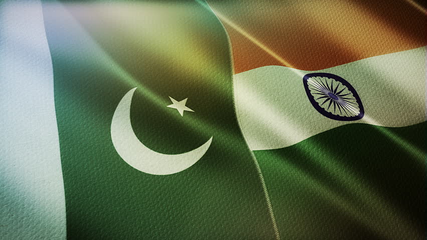 The diagonal and stitched-aligned combined Pakistan and India flags are waving in the wind. Concept of Strategic negotiation, national relationship, Conflict, and War. 