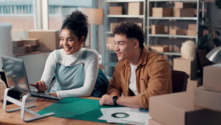 Fist bump, laptop or happy people in small business with logistics goal, package or teamwork. News, approval or entrepreneurs with startup success for online order, parcel sales or inventory target