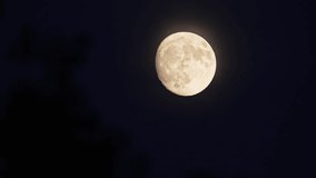 Jet flying in front of the moon at night over Utah. - Powered by Shutterstock - Get 15% off with code: PIKWIZARD15