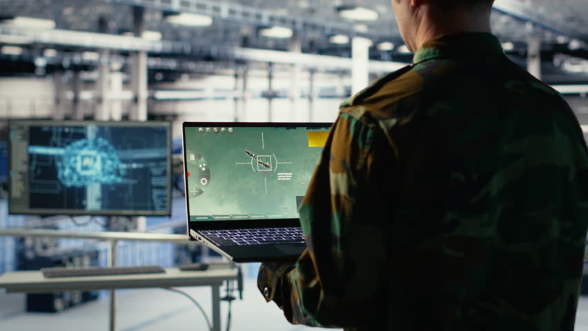 Army specialist in data center integrating AI into radar systems for missile tracking. Military soldier in server room analyzing aerial movement through artificial intelligence systems, camera B
