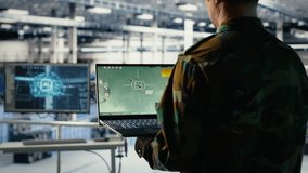 Army specialist in data center integrating AI into radar systems for missile tracking. Military soldier in server room analyzing aerial movement through artificial intelligence systems, camera B - Powered by Shutterstock - Get 15% off with code: PIKWIZARD15