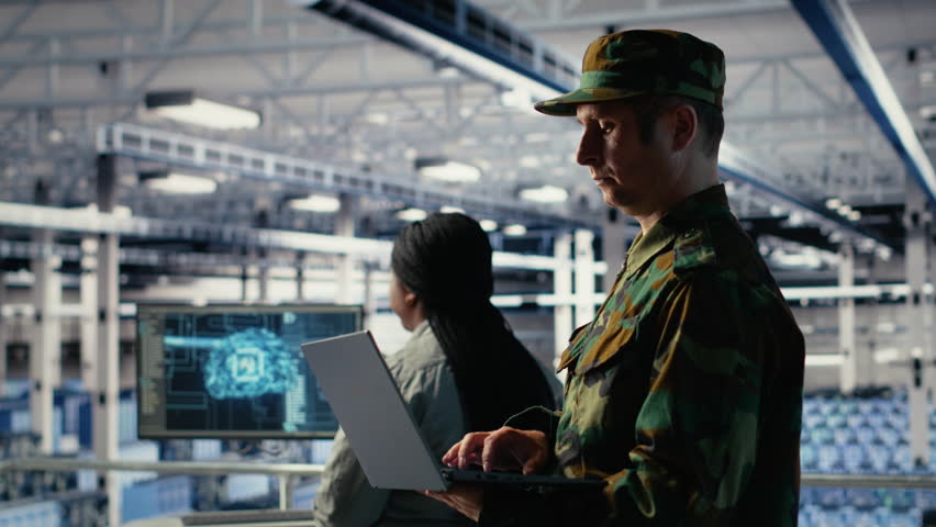 Military soldier and engineer in server room use AI tools to manage computer systems. Army commander and female programmer review information using artificial intelligence in server farm, camera B