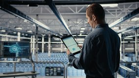 Server room IT expert swiping on tablet touchscreen to read data charts, monitoring equipment health. Admin reviews analysis metrics graphs on device to make sure data center meets goals, camera A - Powered by Shutterstock - Get 15% off with code: PIKWIZARD15