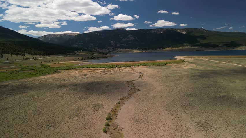 Aerial of Taylor Park Reservoir in summertime in Elk Mountains in summer