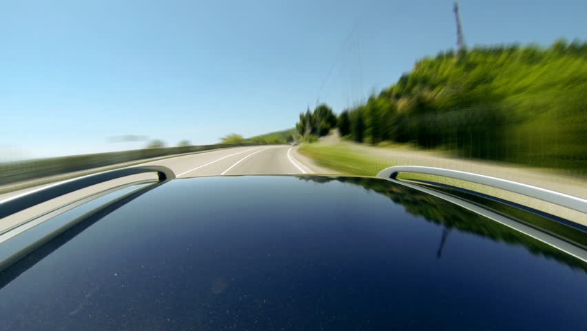 Timelapse view of car on the speed at the beautiful road with mountains.