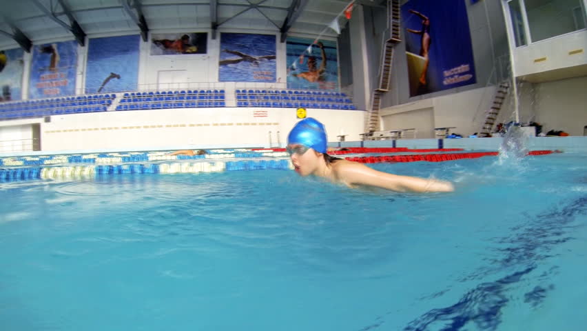 Beautiful view of athlete who is swimming butterfly style