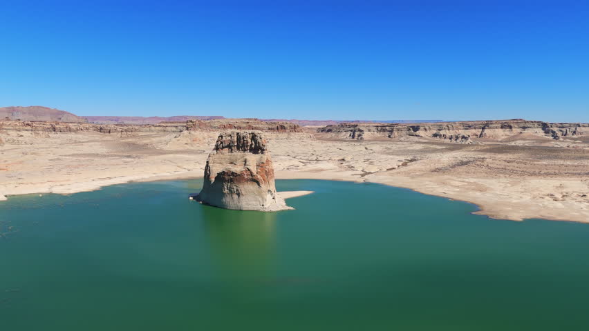 Picturesque Landscape Of Lone Rock By Wahweap Bay In Utah, USA. - aerial shot