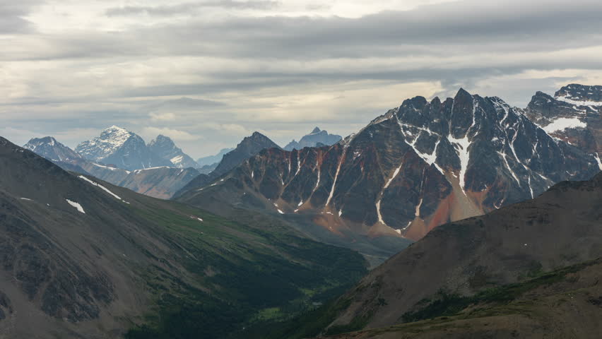 Timelapse of moody clouds and mountain peaks from Whistlers Peak summit in Jasper National Park