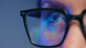 Extreme close-up of a woman’s eyes focused on a monitor while analyzing data, highlighting concentration, technology, and digital work.

 - Powered by Shutterstock - Get 15% off with code: PIKWIZARD15