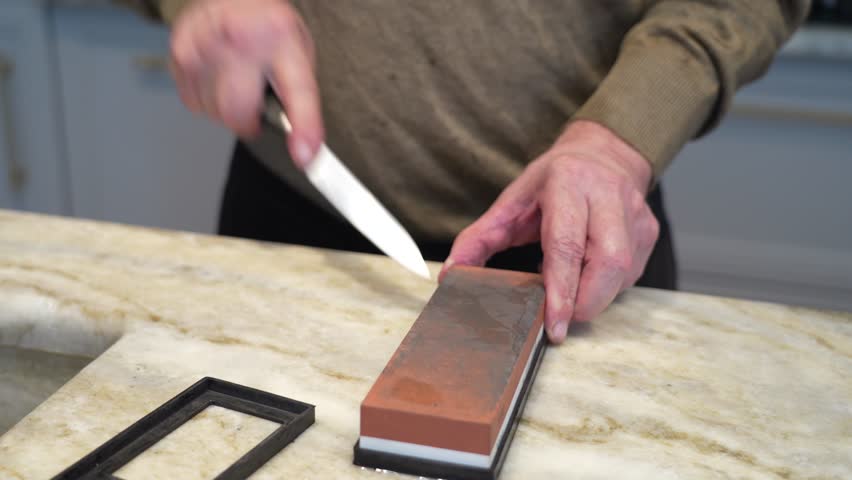 Knife is sharpened with stone and honed with steel, showcasing expertise and precision