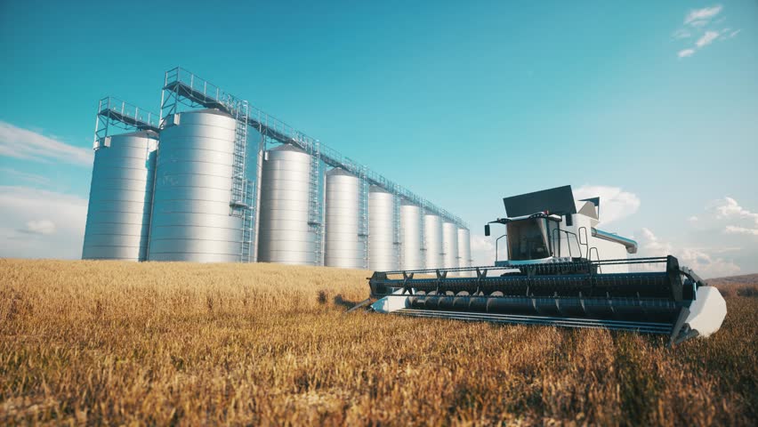 Combine Harvester Unloading Grain into Silo Storage Tank – Realistic Farm Animation. Combine harvester near the grain storage. Grain silo tank storage