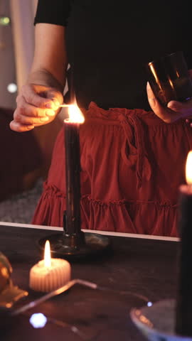 Girl Decorates A Halloween Room And Lights Up Candles With Matches, Vertical Video