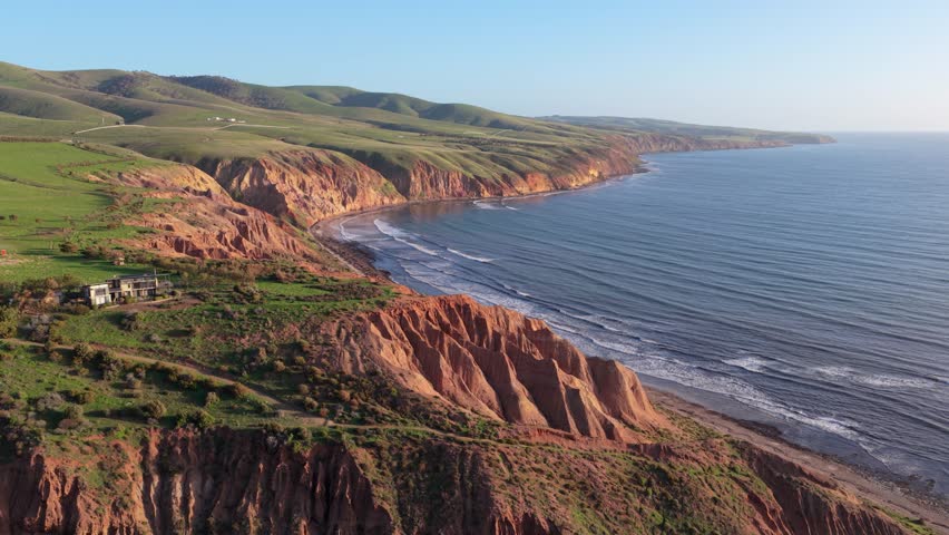 Establishing Wide Aerial of Sellicks Beach Cliffs, Hills and House at Golden Hour, Adelaide, South Australia