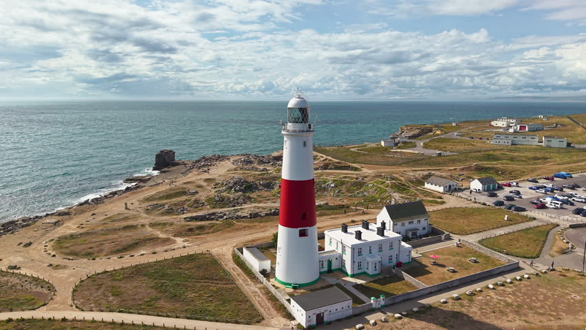 Scenic aerial view of Portland Bill, with its famous lighthouse and rocky coastline.
