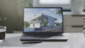 Hands of female seller passing house shaped keychain with keys to client during real estate agreement in office with blurred laptop in background on desk. Close-up view - Powered by Shutterstock - Get 15% off with code: PIKWIZARD15