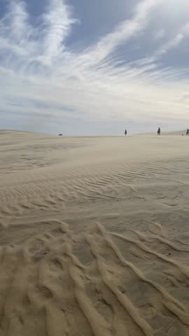 Roaming The Sand Dunes While It Is Windy