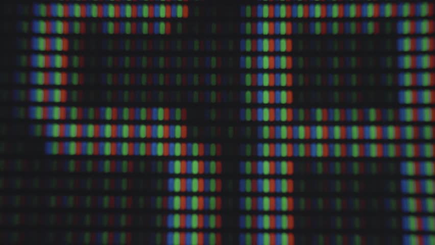 Macro image showing the arrangement of red, green, and blue pixels on a digital screen. Macro