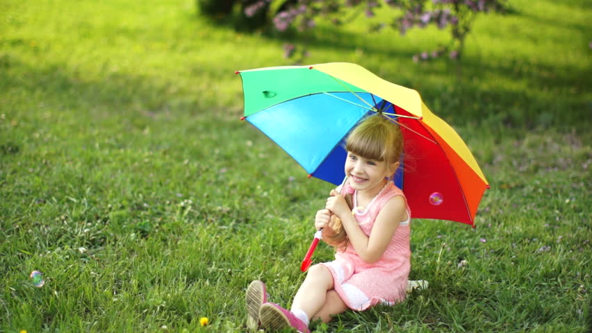 Girl with umbrella hiding
