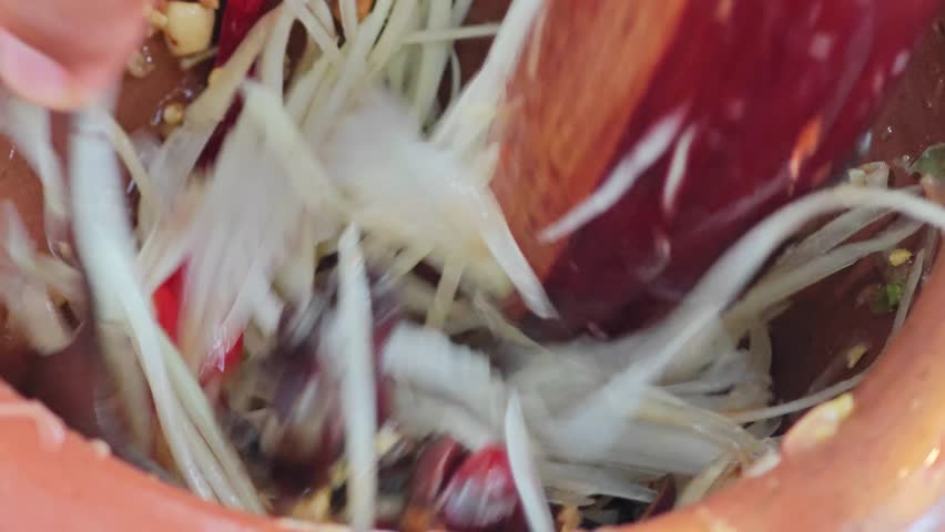 Delicious papaya salad on the background