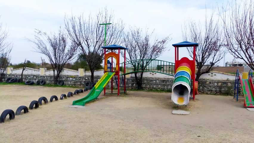 Kids Swings in the park - Public Park view