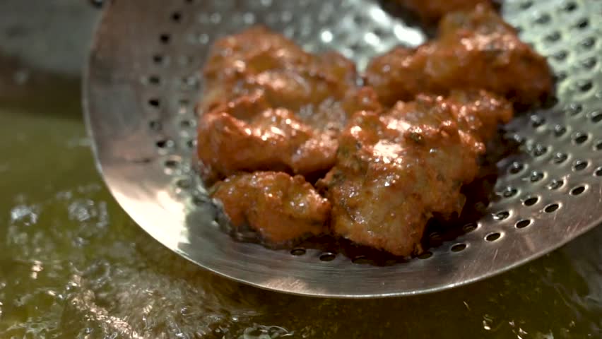 Cooking crispy fried chicken. Fried food.
