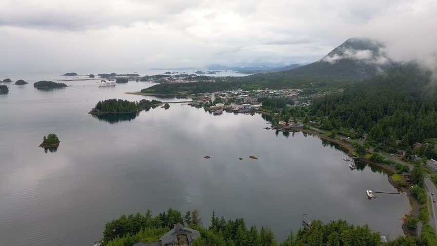 aerial pulling out from sitka alaska over waterway