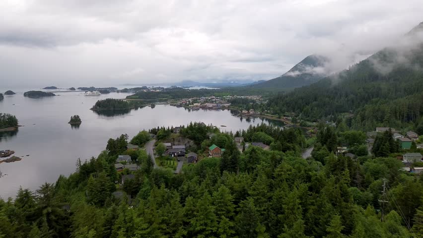aerial push in to homes in sitka alaska