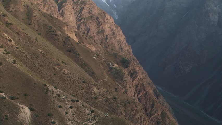 Beautiful drone view of valley in Chitral, Pakistan. Beautiful mountains, beautiful valley, rocks, rural life, spa, nature, travelling, northern area of Pakistan, height, water.