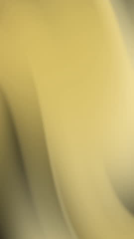 Abstract blurred background with subtle color transitions.